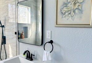 Enjoy the luxury of a bathroom where every detail has been carefully chosen to create a serene and inviting environment.