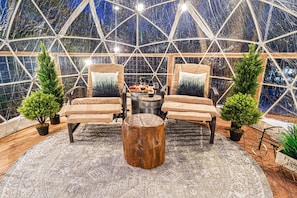 Enjoy with family inside the dome with a glass of wine