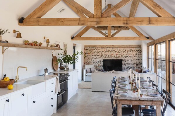 Large kitchen/living/dining space with plenty of room for everyone to cook, eat and relax together. 