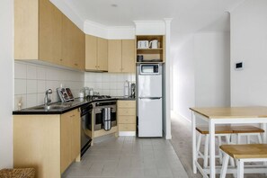 The kitchen comes well equipped with all the essentials including an oven, stove, fridge and dishwasher.
