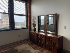 Alternate view of King bedroom with Brutalist-style furnishings