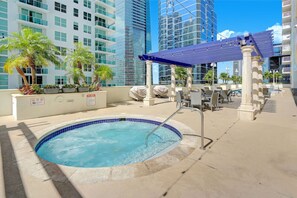 Relax and unwind in the inviting communal hot tub, the perfect retreat after a day of exploring.
