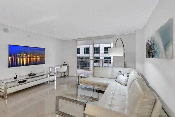 Embrace contemporary comfort in this sleek and stylish living room retreat.