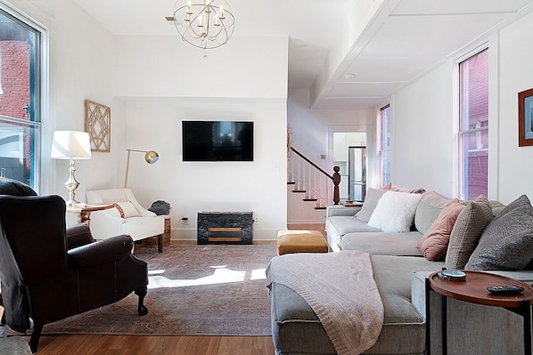 Spacious living room with Roku TV