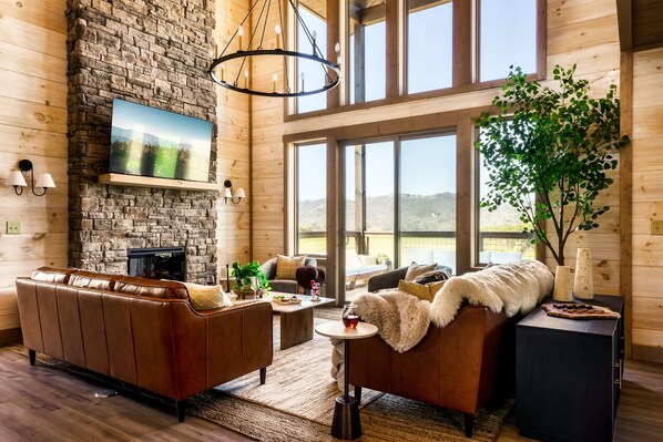 Living Room with gorgeous views out every window.