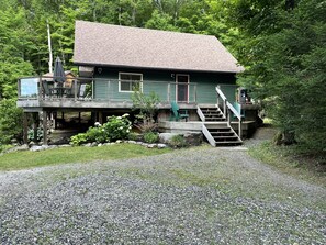 The view from the driveway to the front door of the cottage.