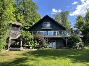 The view from the middle of the lawn. The stairs lead to the deck and gazebo.