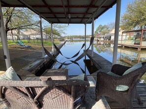 Cozy covered dock seating.