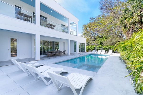 Private Heated Pool with a Baja shelf and whirlpool section.