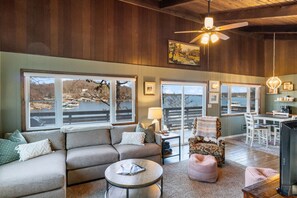 A warm welcome and picturesque views from the inviting living room.