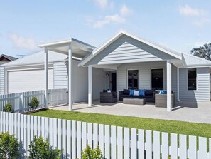 Spacious Backyard Fun! A fully enclosed garden, great for kids and pets to play freely.