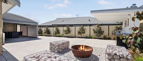 Gather Around the Fire Pit – The perfect spot to unwind under the stars with family and friends.