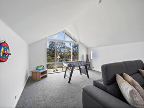 Game On! The loft is a space for fun, relaxation, and a little friendly competition.