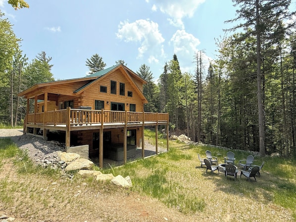 Escape to this charming, newly built log cabin, nestled in a private, wooded setting