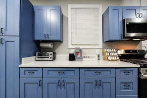The recently remodeled cabinets complement the color palette of this property.
