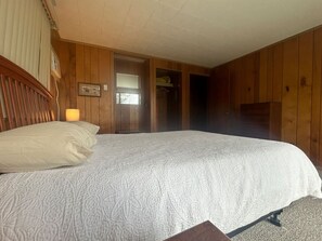 Master bedroom with a queen bed