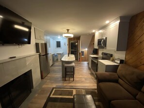 Kitchen w/full size appliances -refrigerator, oven, stove, microwave, dishwasher