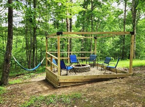 New firepit with solar lights and hammock