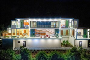 Full frontal of the whole of the Lighthouse villa at night