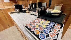 Start your day off right at the fully-loaded coffee bar. Enjoy your choice of drip, k cup, or French press style, ground or whole bean coffee, grinder, frother, countless flavors of k-cups and creamers, and to-go cups if you’re on the go.