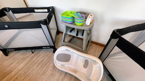 The kiddos are covered—leave the bulky gear at home! You'll have *two* pack-n-play cribs, waterproof crib sheets, a baby monitor, a commercial-grade high chair, kids' dinnerware, and an infant/toddler bathtub.