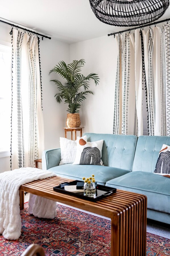 Kick back, relax, and make yourself at home in this inviting living room—perfect for late-night chats or a good movie.