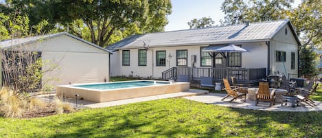 The Cottage has shared access to the backyard pool and fire pit!