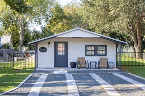 Grab a friend and make the quick drive over to Kobza Cottage. There are two dedicated parking spots for you!