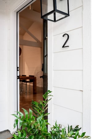 The Guest House (#2) has a smart door lock on the front entry door.