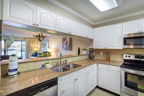 Kitchen overlooking the dining area and living room