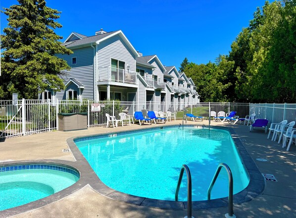 Community Outdoor Pool and Whirlpool Hot Tub open Memorial Day to Labor Day.