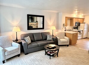 Living room space with seating to enjoy each other's company with new furniture.