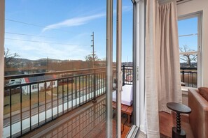 Embrace panoramic views and gentle breezes as you relax on your private balcony.