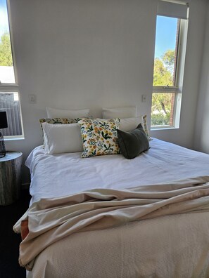 Two king size beds are in the house. One can be made into two long singles. 