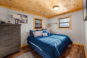 Need extra storage? A spacious dresser offers plenty of room to unpack and settle in, making you feel right at home.