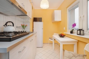 Separate kitchen with dining area