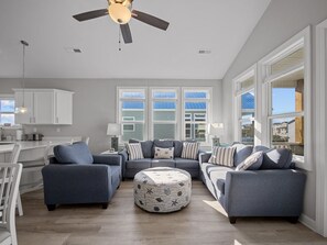 Living room with queen sleeper sofa.  Linens are included for sleeper.