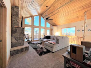 Our favorite part of the home - the wall of windows! Let the outdoors in!