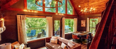 Upscale Open Concept Living Room with 55in Roku TV & Electric Fireplace.