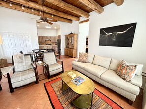 A living room with couches and a coffee table.