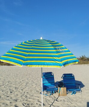 chairs, umbrella, sand crank, cooler 