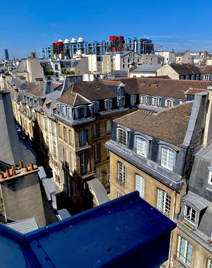 View from living onto 16030 baroque mansion Montmor and the Pompidou Museum 
