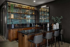 Kitchen: Perhaps the most striking space in the apartment is its high-end kitchen with brass accents.