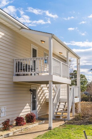 This is your entrance! Up to outside stairs to the top two levels of the home. (The lower level is not included but no one will be staying there either!).