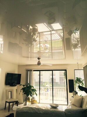 Vinyl stretch ceiling, brings more light in.and outside in.  Stunning!