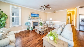 This cozy living room invites you to relax in beachy elegance