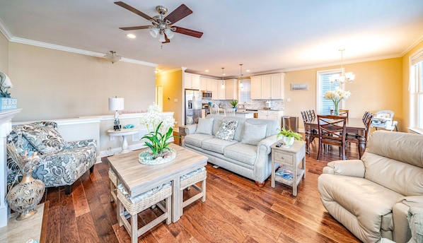 This inviting open-concept space features ample seating