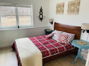 First bedroom. Brand new beds, linens, furniture and high end fixtures