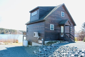Parking for 2 vehicles located to the left of the house with a private entrance