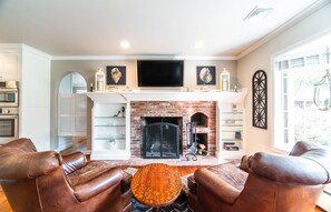 Working fireplace in kitchen great room combo. Great space